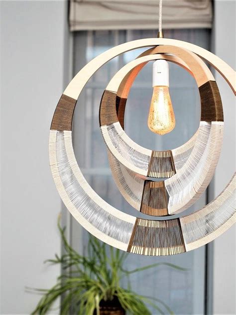 Elevating the Dining Experience with the Whirl Magical Orb Lamp: Dining Room Lighting Ideas